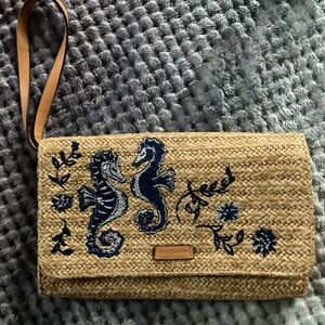 New straw wristlet with embroidered seahorses